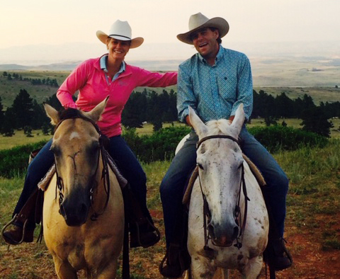 Sarah & Nick on horses in Wyoming